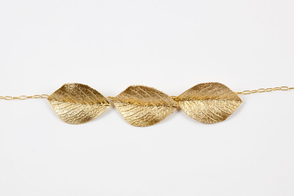 Headband cléo, chaine en laiton et feuilles en métal plaqué or, 40€, Calopsitte
